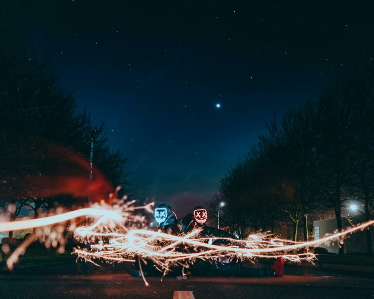 Dynamic night photography featuring LED masks, light trails, and a starry sky, creating a mesmerizing urban ambiance.
